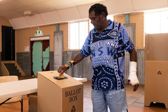 Alfred Murdoch casts his vote at the Cherbourg voting centre in the Queensland seat of Wide Bay. It was one of just three booths in the seat to vote Yes.
