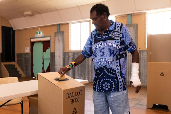 Alfred Murdoch casts his vote at the Cherbourg voting centre in the Queensland seat of Wide Bay. It was one of just three booths in the seat to vote Yes.