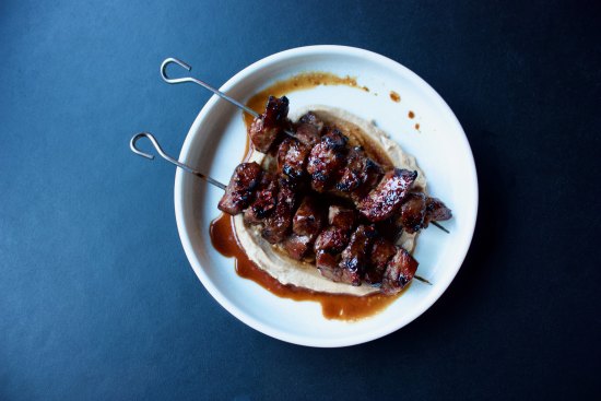 Lamb neck with fermented honey and roast cashew cream.