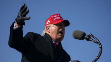 President Donald Trump speaks during a campaign rally in Iowa.