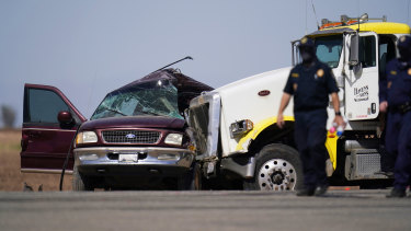 Where the semi-trailer met the passenger vehicle. 