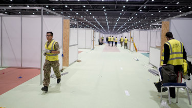 The military and contractors build the NHS Nightingale Hospital at the ExCel Centre in  London for COVID-19 patients.