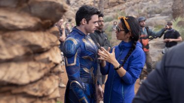 Richard Madden and director Chloé Zhao on the set of Eternals.