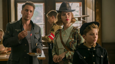 Sam Rockwell (left), Scarlett Johansson and Roman Griffin Davis in Jojo Rabbit. 
