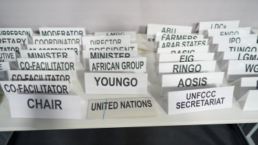 Department and position name plates laid out before negotiations begin on Thursday.