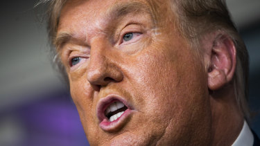 US President Donald Trump speaks during a news conference at the White House before meeting Michigan legislators.