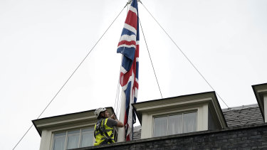 Flags above Downing Street are lowered to half-mast to honour Ammes.