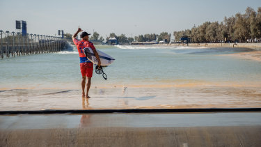 Surfing icon Kelly Slater enters the pool to compete at the Surf Ranch in California.