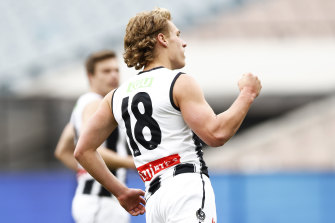 Finlay Macrae celebrates a goal for the Pies.