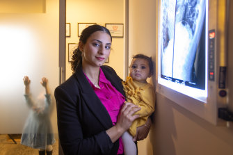 Chiropractor Diana Pakzamir runs a business, as does her husband, but has noticed mothers are still mainly doing the mental tasks of running a family.