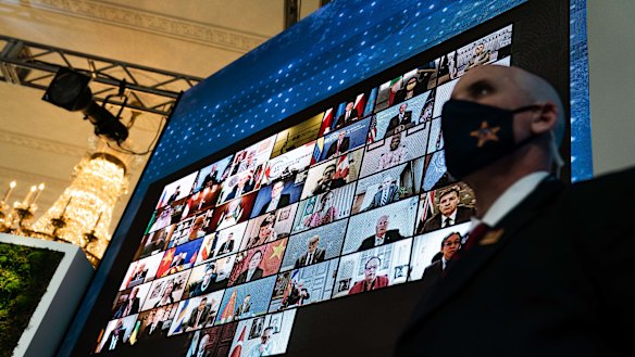 World leaders listen remotely during the virtual Leaders Summit on Climate in the East Room of the White House in Washington, DC. 
