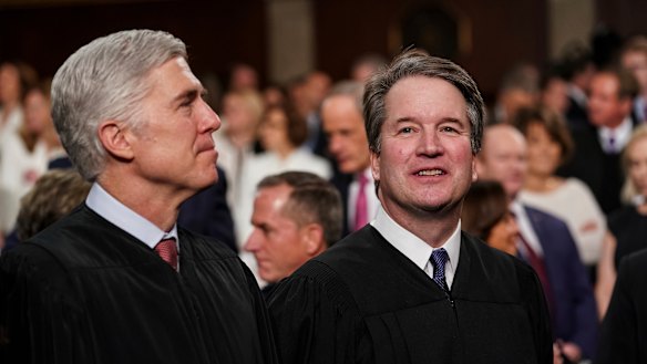 Supreme Court Associate Justices Neil Gorsuch, left, and Brett Kavanaugh