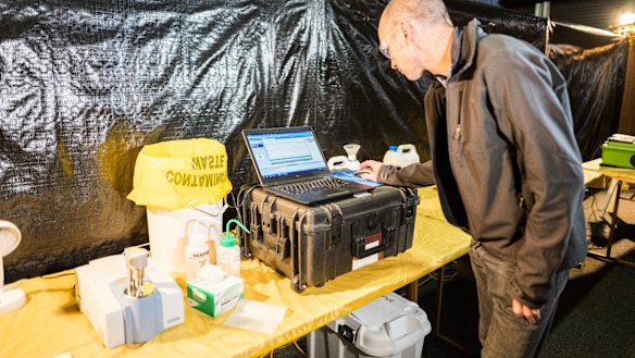 Senior pill-testing chemist Mal Mcleod demonstrates how a pill might be tested  at the Groovin' the Moo festival in April.