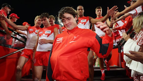 Errol Gulden walks down the race after being injured against Brisbane in March.