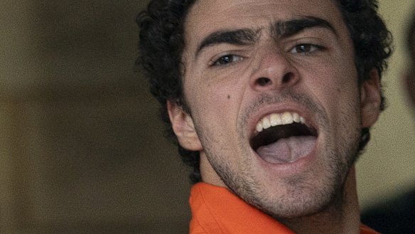 Suspect Luigi Mangione is taken into court in Pennsylvania on Tuesday. 