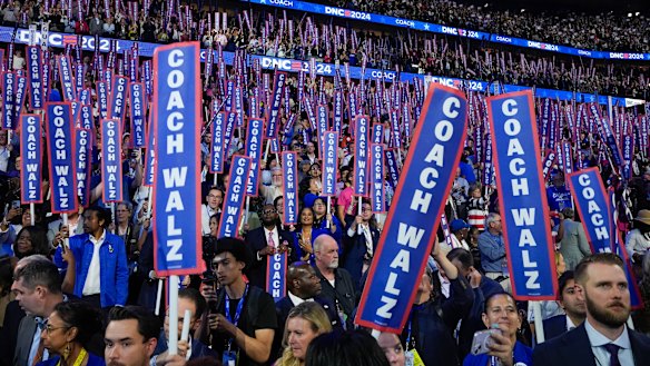 The crowd welcomes the vice presidential nominee Tim Walz.