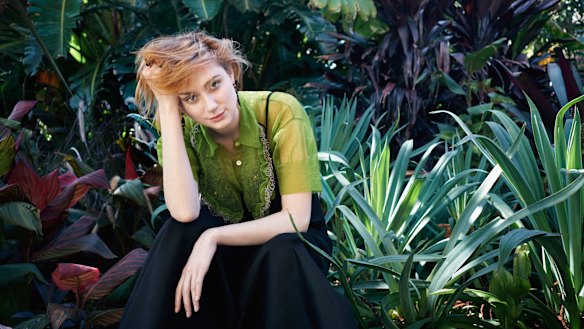 Miu Miu dress and
shirt. Ring from Greene &
Greene Antiques. 