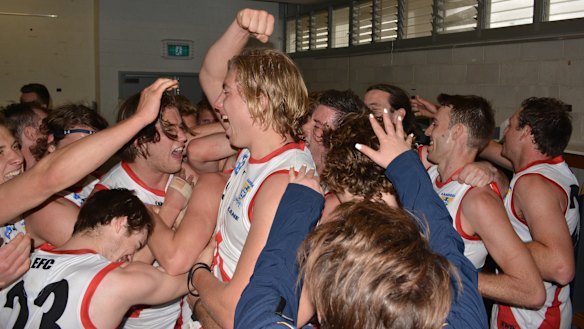 The Canberra Demons celebrate their first NEAFL finals win.