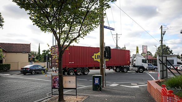 A container truck at the intersection of Macaulay, Epsom and Kensington roads in Kensington.