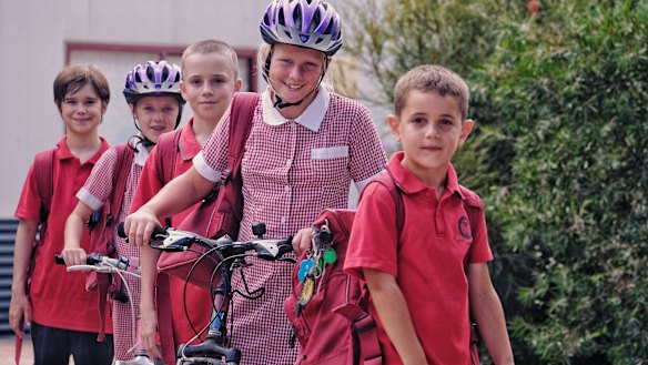 Sam, 7, Claire, 9, David, 11, Chantelle, 10 and Connor, 11, try to walk or ride to school as often as possible.