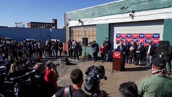 Beyond parody: The Trump administration's bizarre "Four Seasons" press conference in the car park of a landscaping company in industrial Philadelphia.