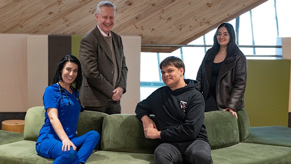 Victoria University vice chancellor Adam Shoemaker with Brooke Theodoridis, Denzel James and Athraa Yousif.