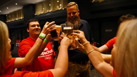 Labor’s Dan Repacholi, who retained his seat of Hunter, watches the count with the party faithful on Saturday night at Cessnock Leagues Club.