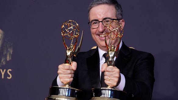 John Oliver wins outstanding writing for a variety series and outstanding variety talk series for Last Week Tonight with John Oliver.