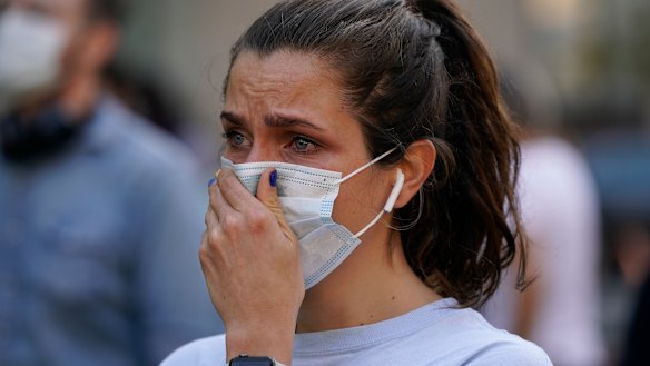 Olivia Cox is emotional as she learns that Biden has been declared the winner. 