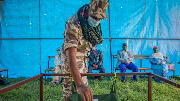 A member of the Tigray Special Forces casts his vote in a local election in the regional capital Mekelle in September. The Ethiopian government declared the election illegal.