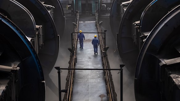Workers of Caofeidian Port in Hebei Province. 