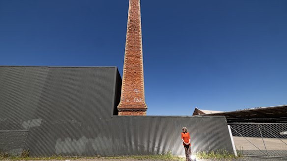 Beggs-Sunter beneath the chimney that will be preserved on the development site.