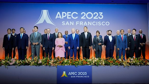 Leaders pose for a “family photo” at the the annual Asia-Pacific Economic Cooperation summit.