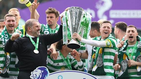 Ange Postecoglou lifts the trophy with Celtic last season.
