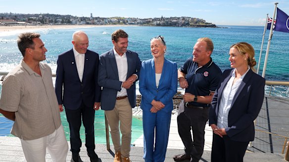 Administrators and athletes at the launch of Guardians League, a new surf racing competition set to launch in 2027. From left to right: Ky Hurst (Olympian and ironman), Graham Ford (president International Life Saving Federation), Adrian Tobin (Guardians League co-founder), 
Kim Crane (CEO Paddle Australia), Adam Weir (CEO Surf Life Saving Australia) and Jenny Mann (sport administrator and co-founder). 