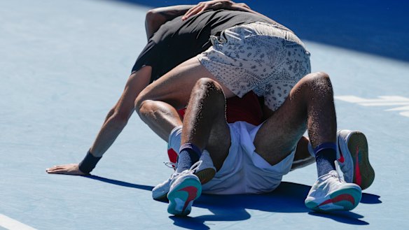 Thanasi Kokkinakis (top) and Nick Kyrgios share a special moment.