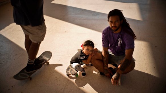 Yojany Perez, 28, and his daughter Coraline Perez Padilla. Perez, who has an economy degree but works in maintenance, said with the arrival of a new Cuban president, people are expecting an improvement in the economy.