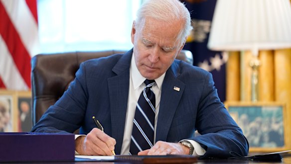 US President Joe Biden as he signed the American Rescue Plan, a coronavirus relief package, in the Oval Office of the White House on Thursday.