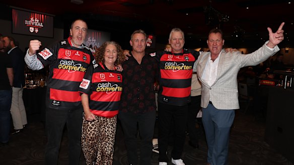 Josh Stuart (centre) celebrates with fans, including Mark Preston (far right), the father of Canterbury’s Jacob Preston.