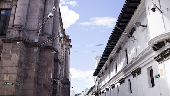 Cameras on a street in Ecuador in 2018. Cameras across the country send footage to monitoring centres to be examined by police and domestic intelligence.