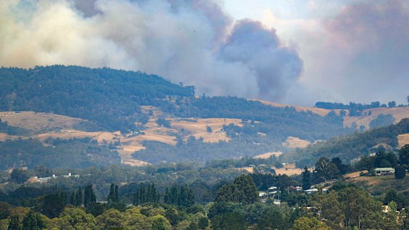 Smoke billows from a wildfire south of Huonville in southern Tasmania on Tuesday.