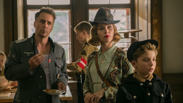 Sam Rockwell (left), Scarlett Johansson and Roman Griffin Davis in JoJo Rabbit. 