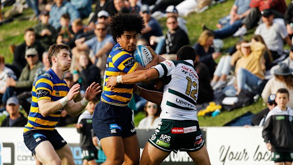Sydney University's Ofa Manuofetoa takes a carry in his side's victory over Warringah in round one. 