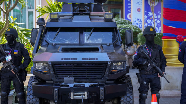 Security personnel stand guard at the Phnom Penh venue for the East Asia summit and other ASEAN-related meetings.