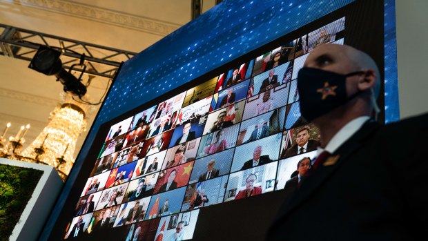 World leaders listen remotely during the virtual Leaders Summit on Climate in the East Room of the White House in Washington, DC. 