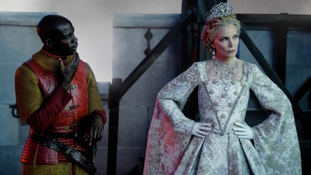 Michelle Pfeiffer as Queen Ingrith and David Gyasi as Percival in Maleficent: Mistress of Evil.