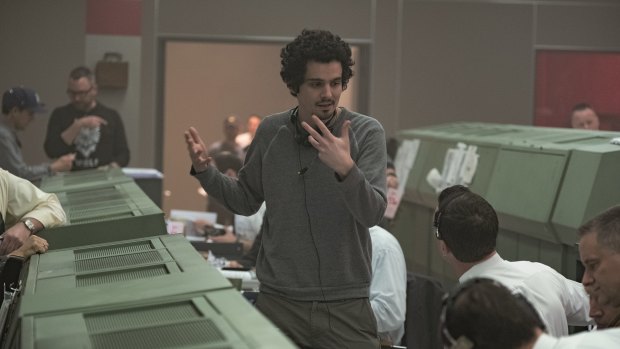 Director Damien Chazelle on the set of First Man.