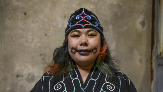 Biennale artist Mayunkiki (Japan) explores traditional Ainu face tattoos. 