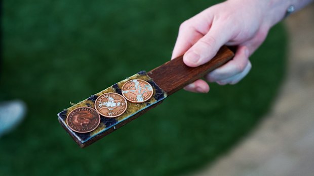 Two-up is often played with three coins.