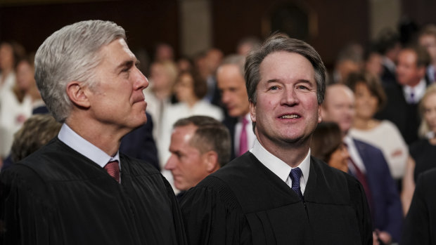 Supreme Court Associate Justices Neil Gorsuch, left, and Brett Kavanaugh